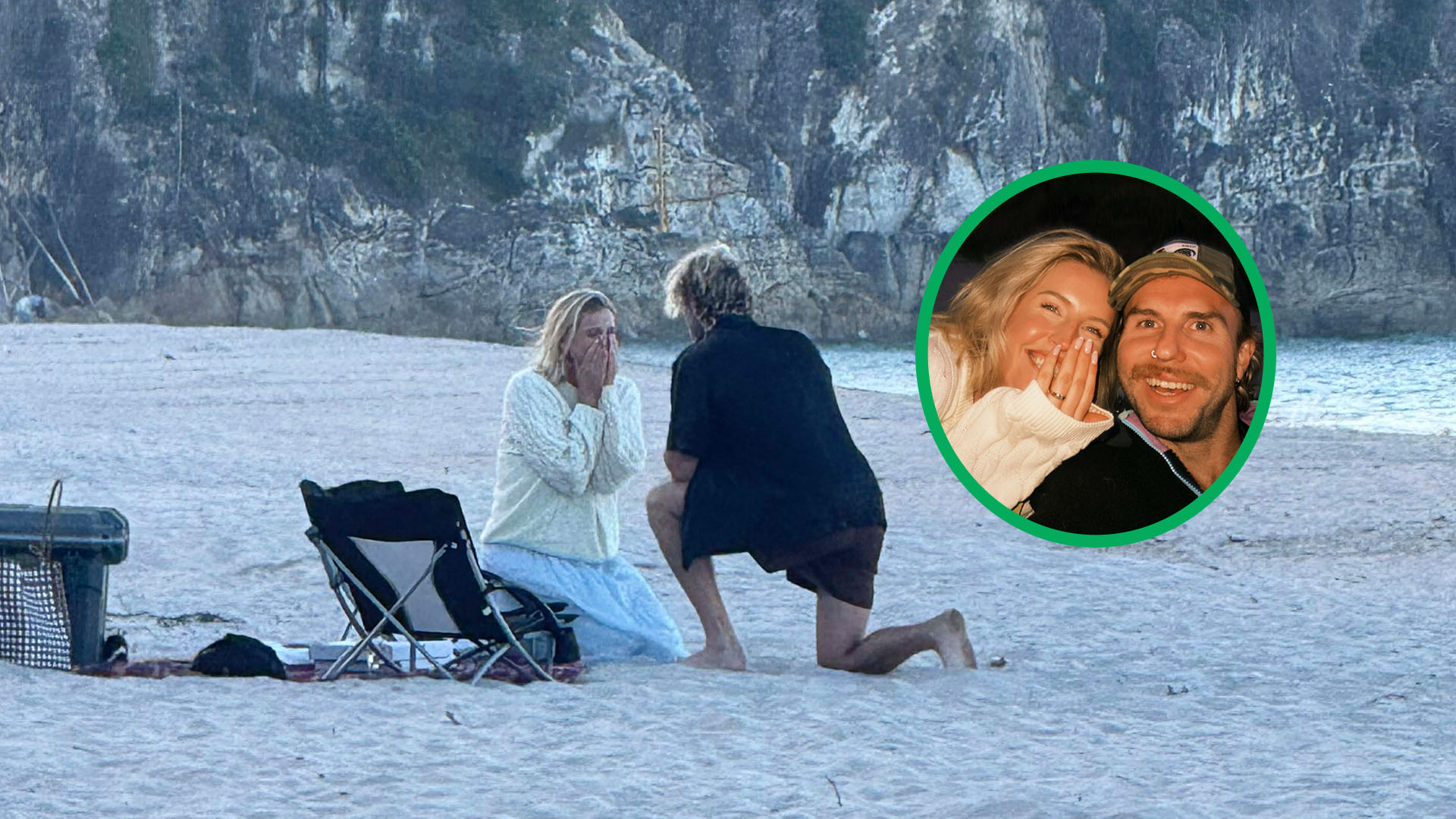 A man kneels on a sandy beach, proposing to a surprised woman covering her mouth, next to a beach chair; an inset shows the smiling couple with the woman wearing a ring.