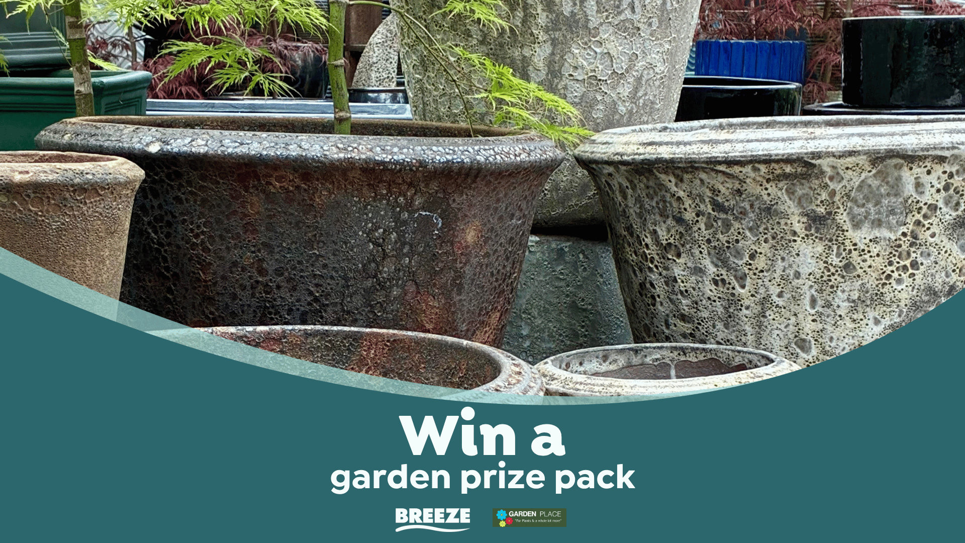 A collection of various textured ceramic plant pots in different earthy tones, some containing green plants, with a teal overlay at the bottom promoting a "garden prize pack."