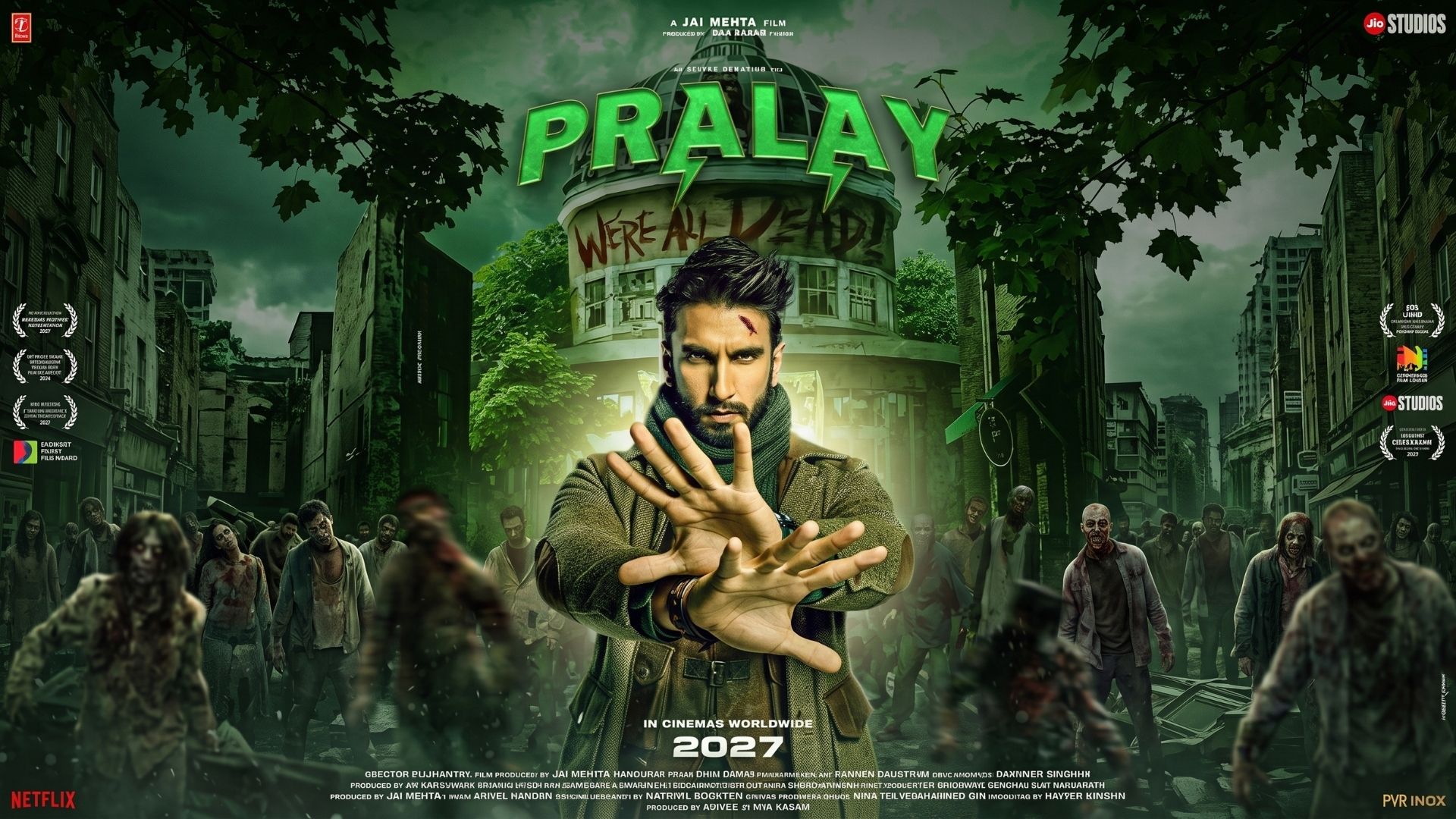 Ranveer Singh, with a scar, stands with outstretched hands against a backdrop of a ruined city filled with zombies and the green title "PRALAY."