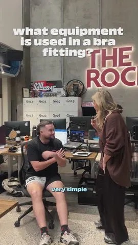 Sarah talking to boys in the office