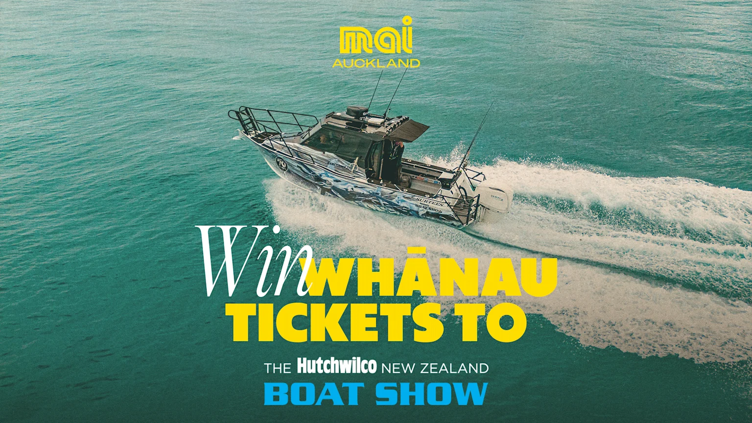 A speedboat with a unique hull design speeds across turquoise water, with text overlay advertising "Win WHĀNAU TICKETS TO THE Hutchwilco NEW ZEALAND BOAT SHOW".