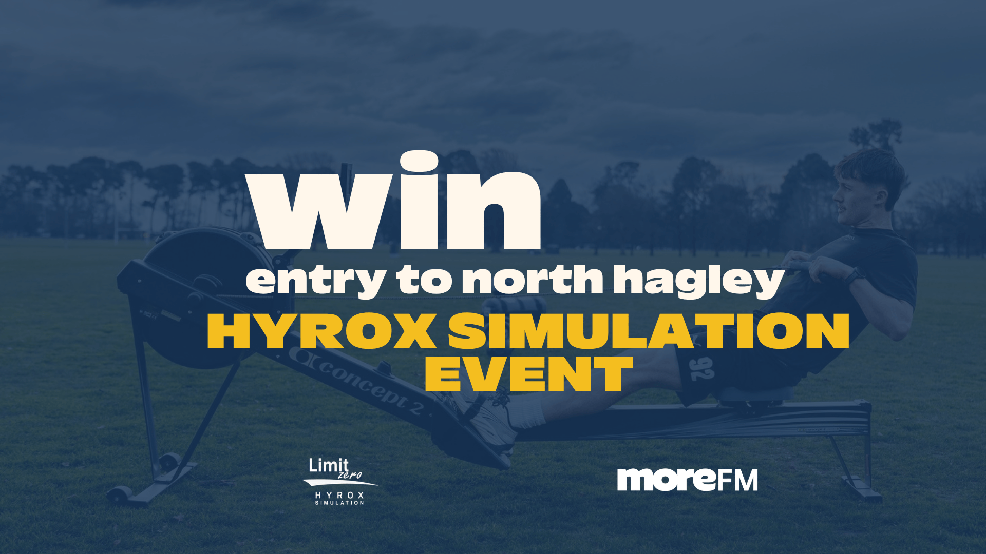 A person is on a Concept2 rowing machine outdoors on grass, with text "win entry to north hagley HYROX SIMULATION EVENT" and "Limit zero" and "moreFM" logos overlayed.