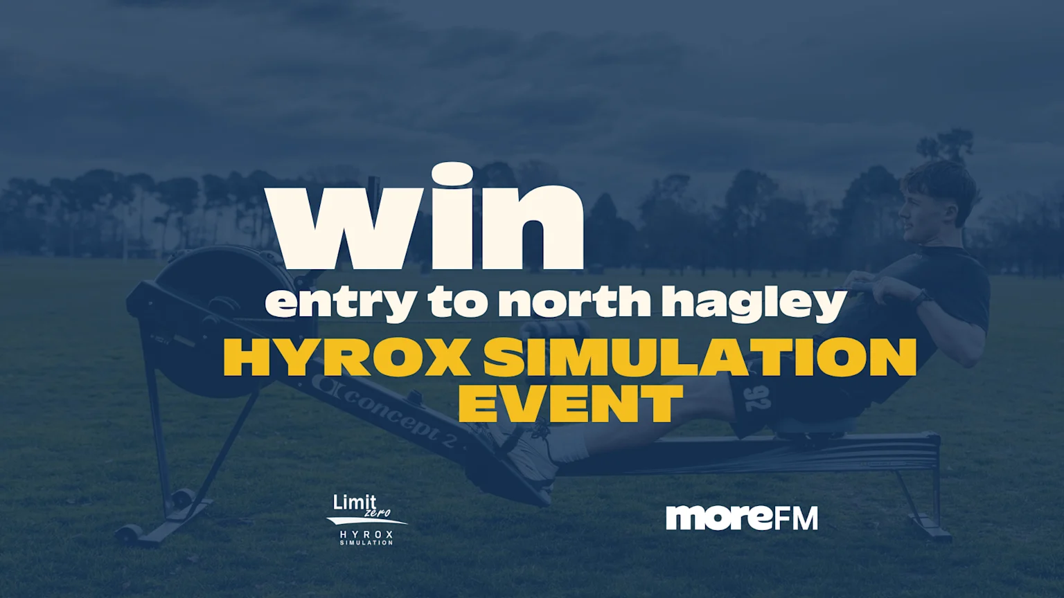 A person is on a Concept2 rowing machine outdoors on grass, with text "win entry to north hagley HYROX SIMULATION EVENT" and "Limit zero" and "moreFM" logos overlayed.