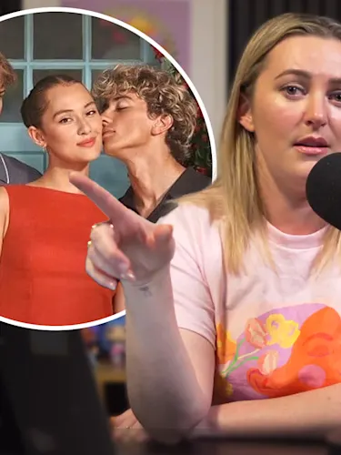 Sharyn Casey speaking into a microphone in front of a photo of the cast of The Summer I Turned Pretty