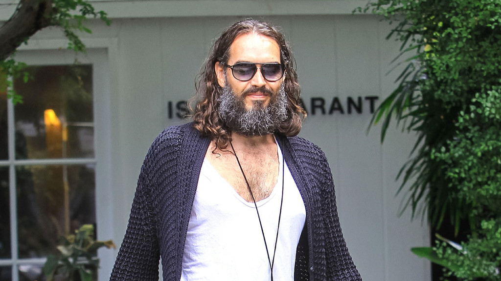 Prosecutors describe Russell Brand as 'sexual predator' as rape trial begins