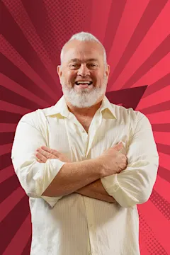 Mark McCarron smiling against a starry red background