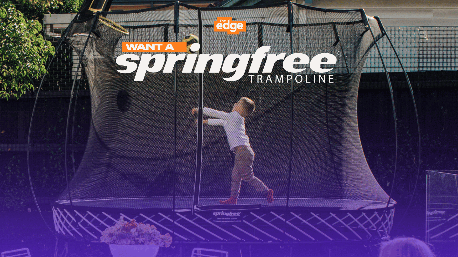 A child plays on a Springfree trampoline with a safety net, while "WANT A springfree TRAMPOLINE" and "The edge" logos are overlaid.