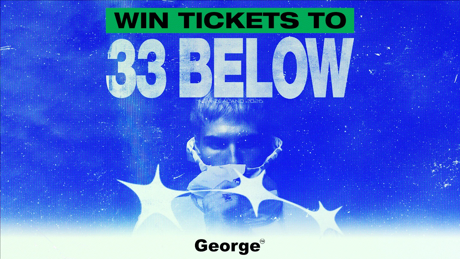 A blue, textured poster announces 'WIN TICKETS TO 33 BELOW NEW ZEALAND 2026' above a masked person and star shapes, with 'George' at the bottom.