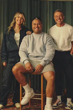 Tegan, Fame and Nickson smiling at a music studio