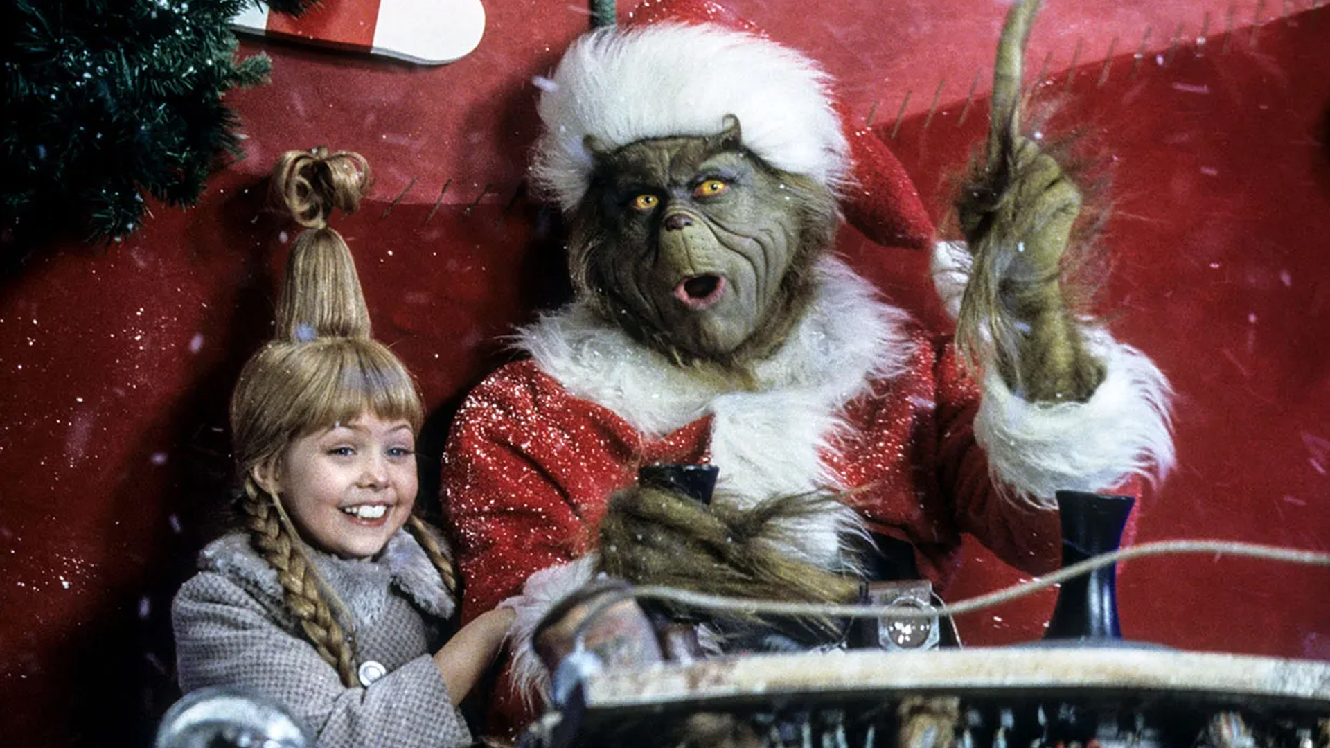 Jim Carrey and Taylor Momsen in their 'How the Grinch Stole Christmas' movie roles