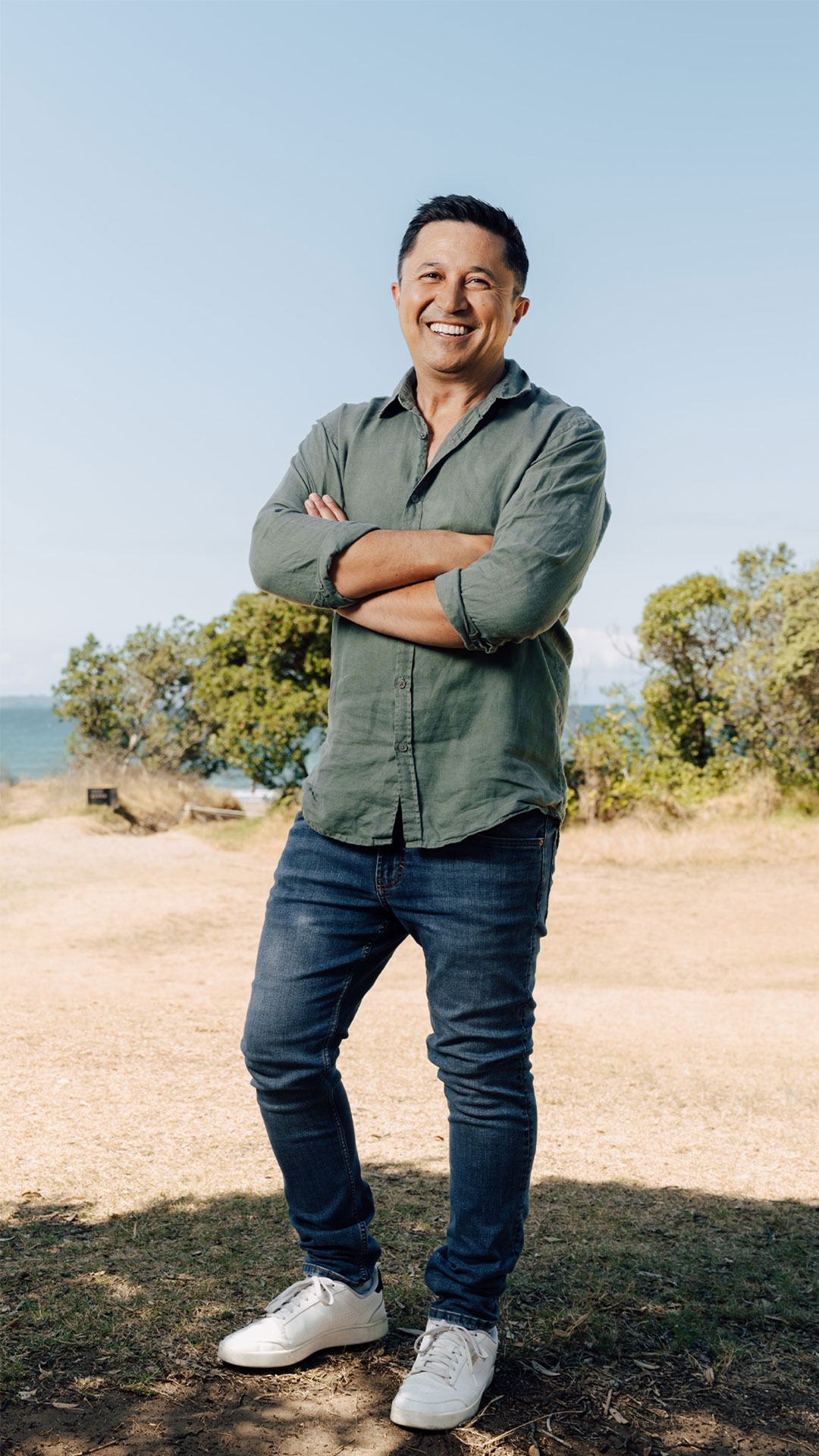 Mike Puru standing with trees in background