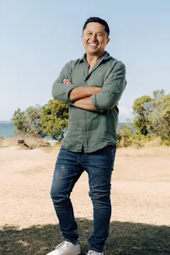 Mike Puru standing with trees in background