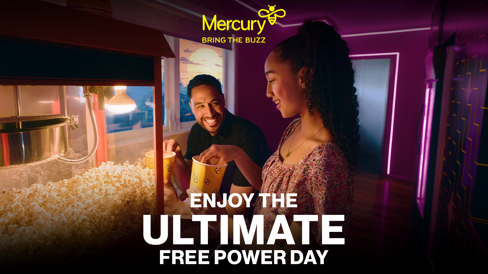 A smiling man and woman joyfully scoop popcorn from a machine in a vibrantly lit room, with the Mercury logo and "ENJOY THE ULTIMATE FREE POWER DAY" text.