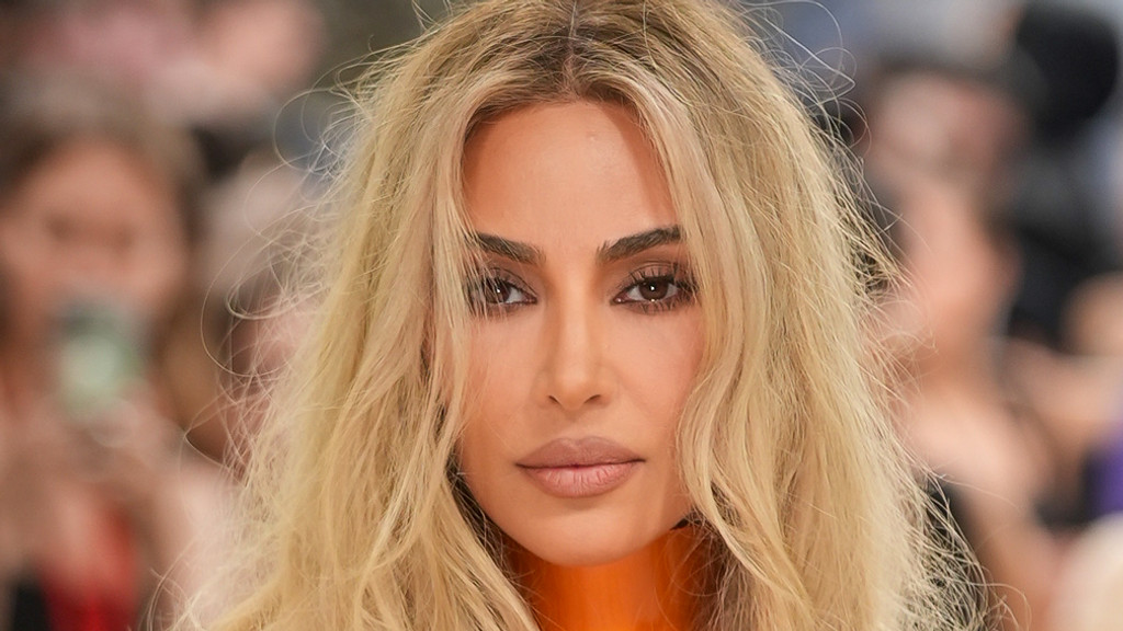 Kardashian clan celebrates Lewis Hamilton's first Formula 1 win for Ferrari.
