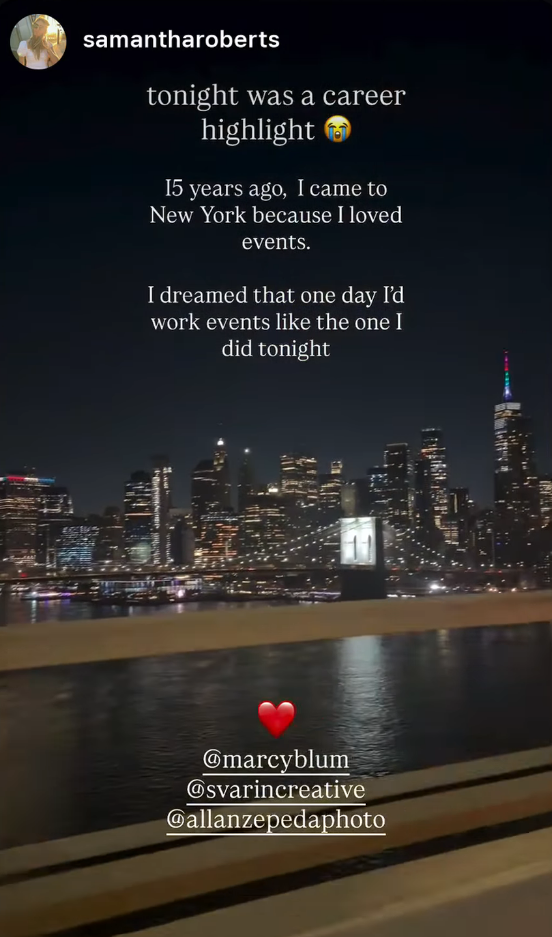 A social media story by samantharoberts with text about a career highlight working events, overlaid on a night photo of a city skyline over water, with a heart and three tagged usernames.
