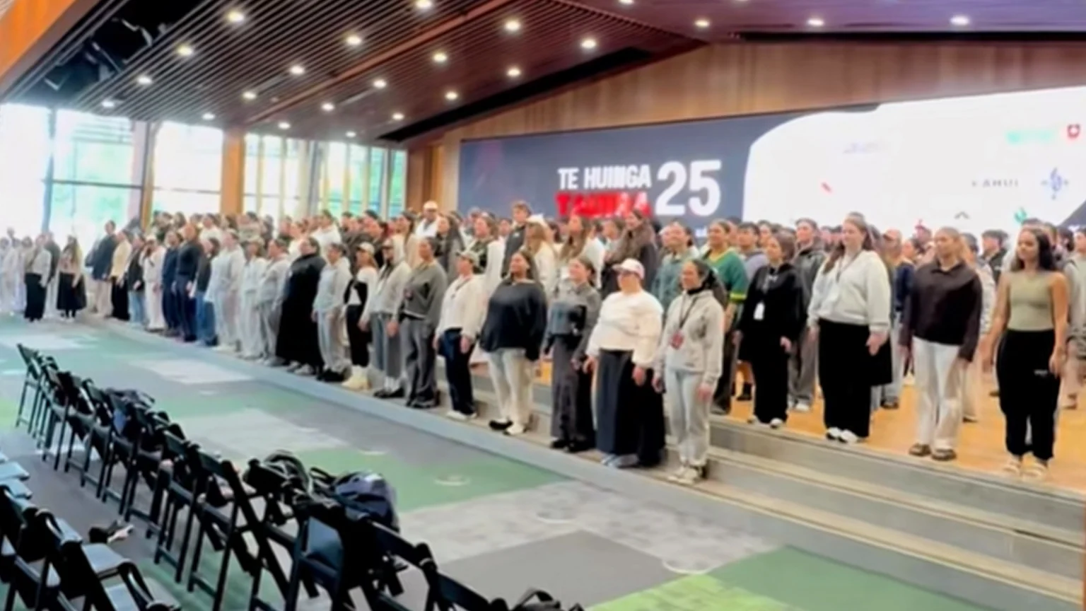 A group of over 100 Māori Students at Te Huinga Tauira 2025 singing a waiata