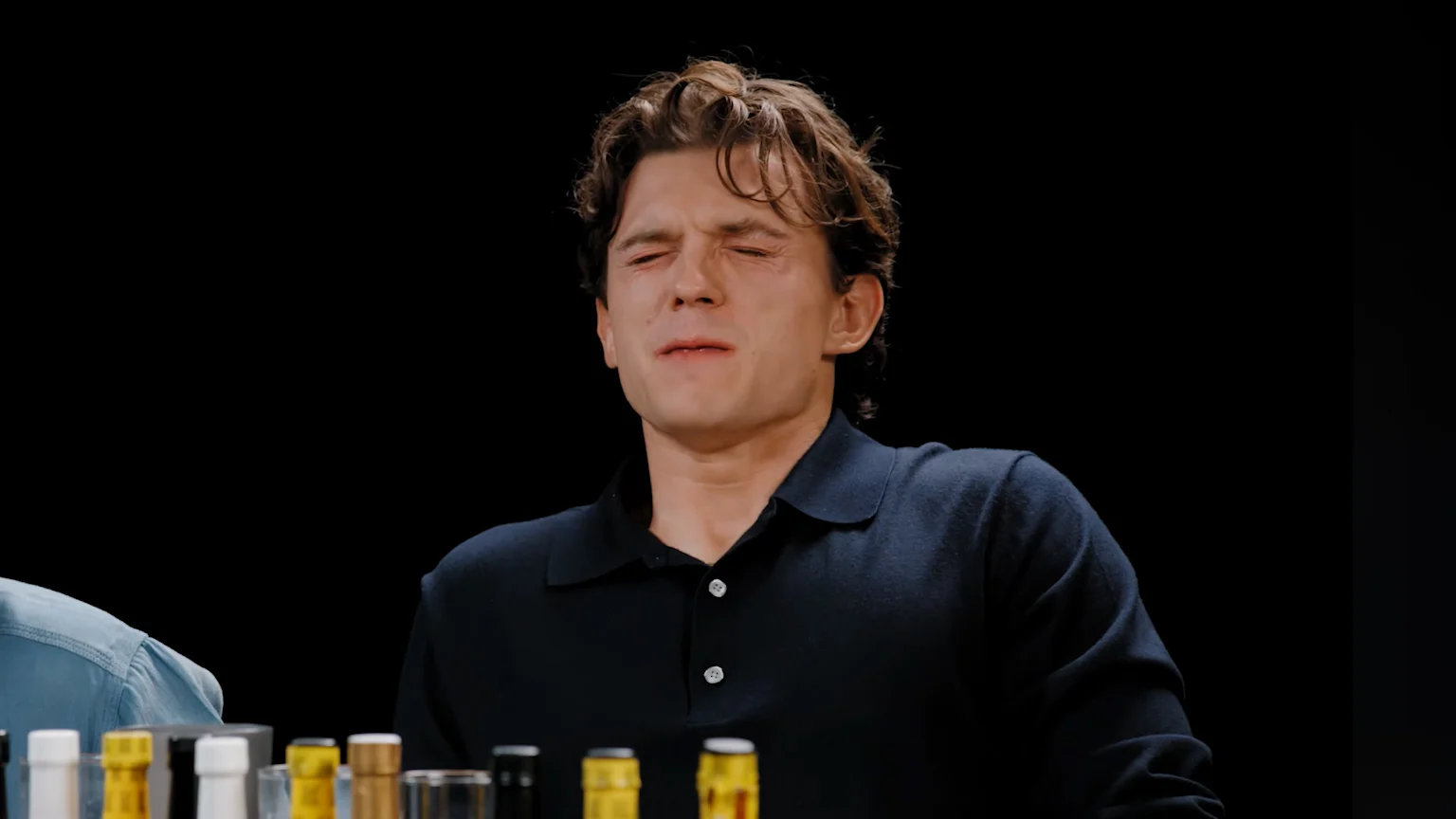 Tom Holland on Hot Ones struggling with the spice level of the hot wings
