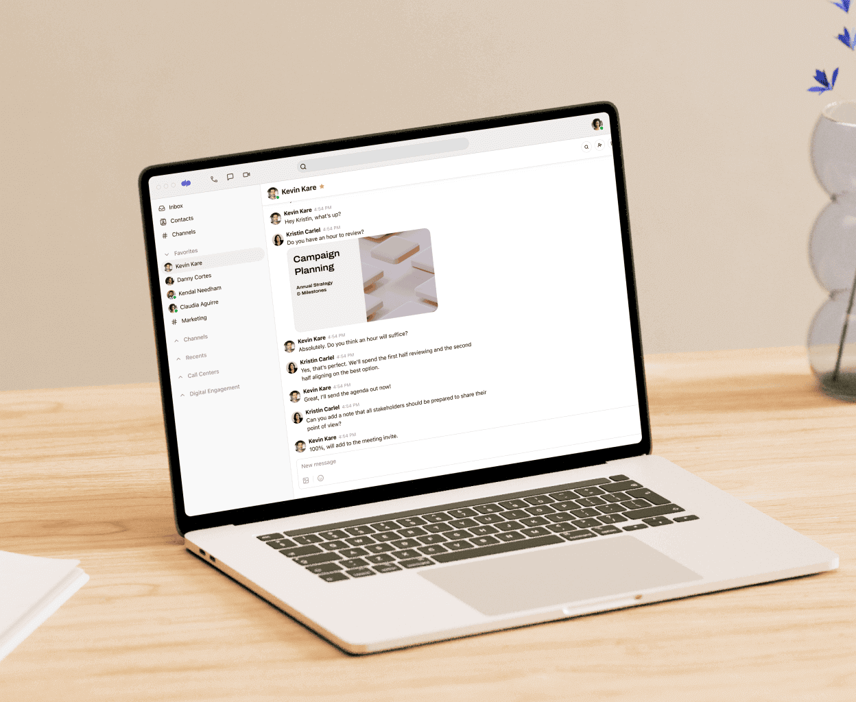 A laptop showing Dialpads messaging feature
