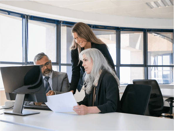 Three people working together