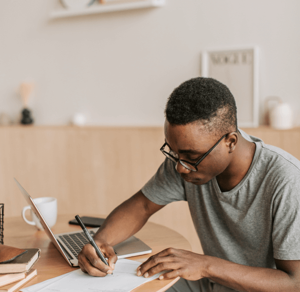 A student writing notes