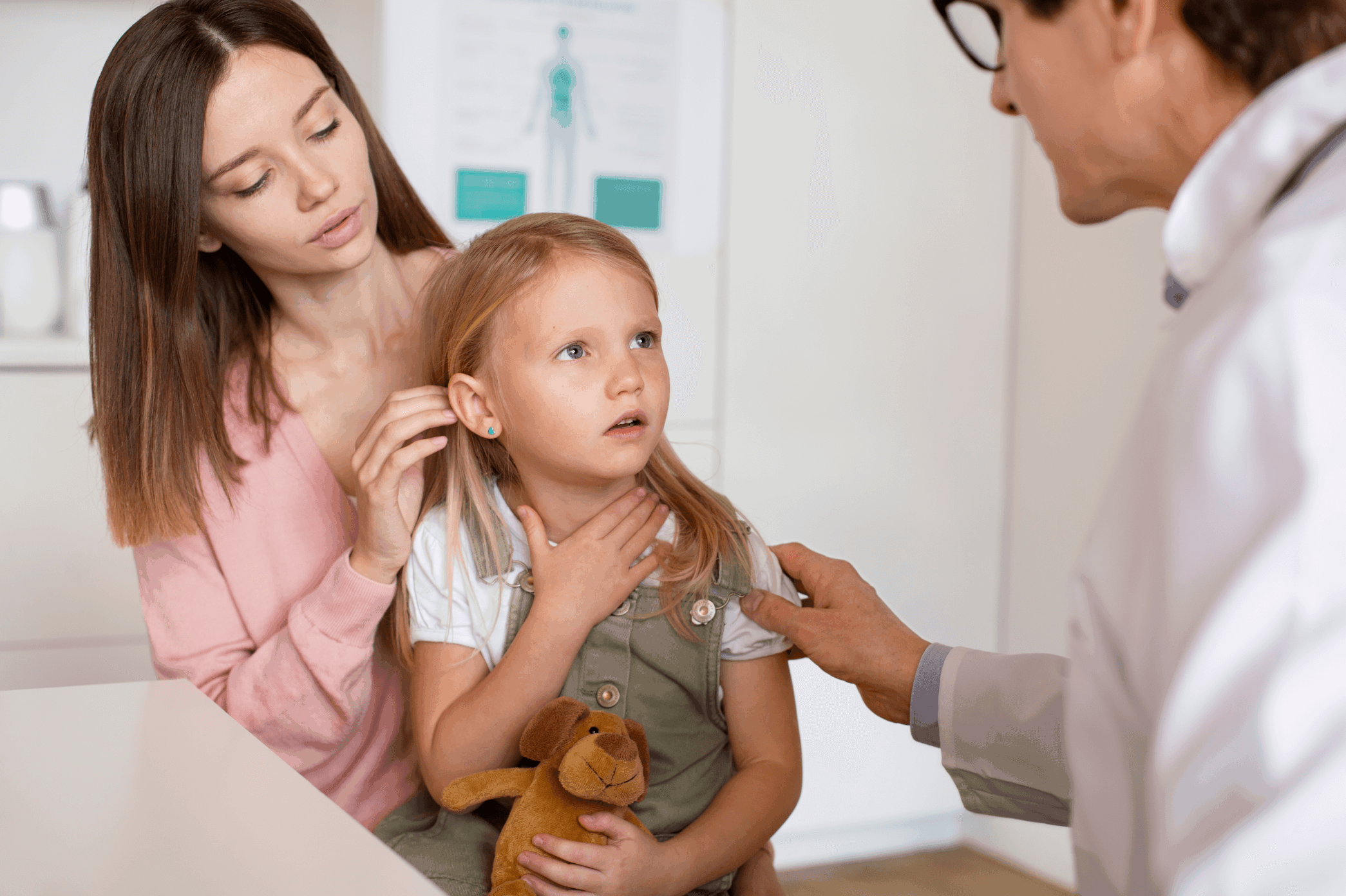 Young mother with her daughter at the pediatrician for consultation