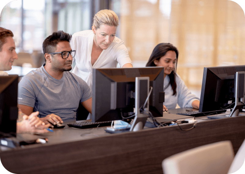 Four people working together