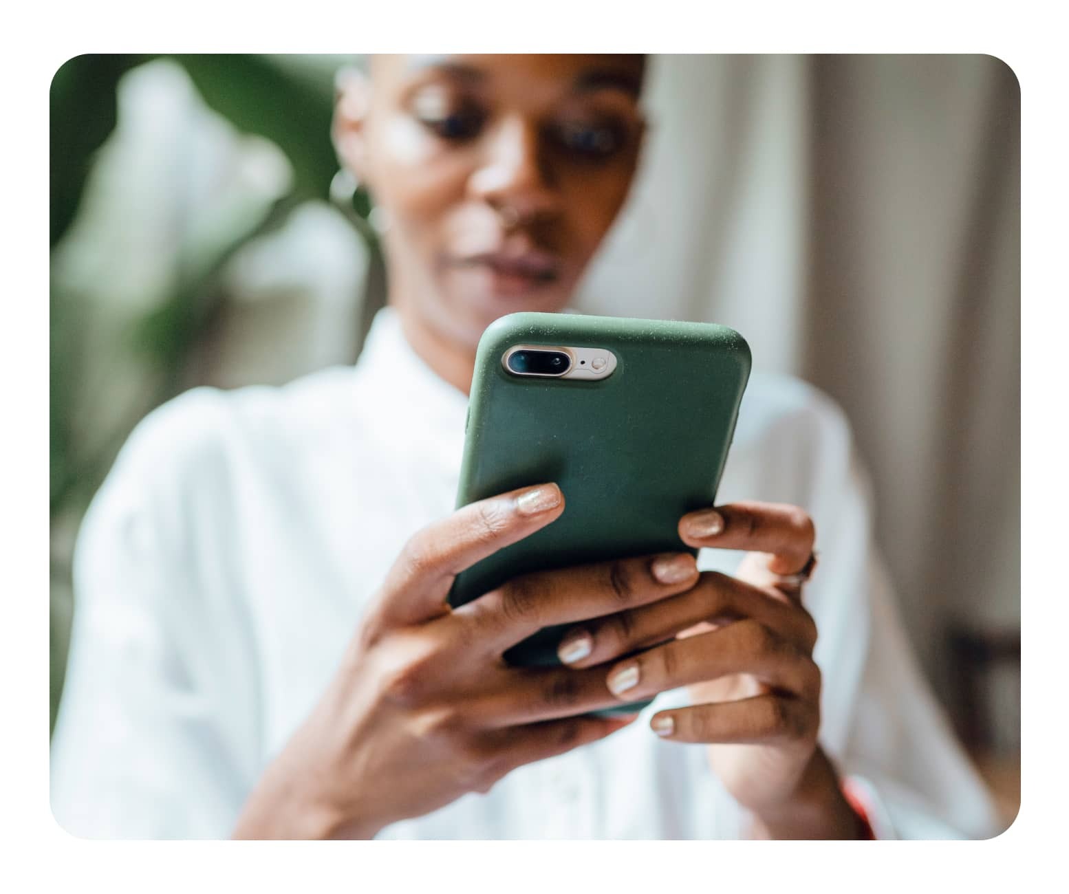 A person using a mobile phone T Mobile Collaborate