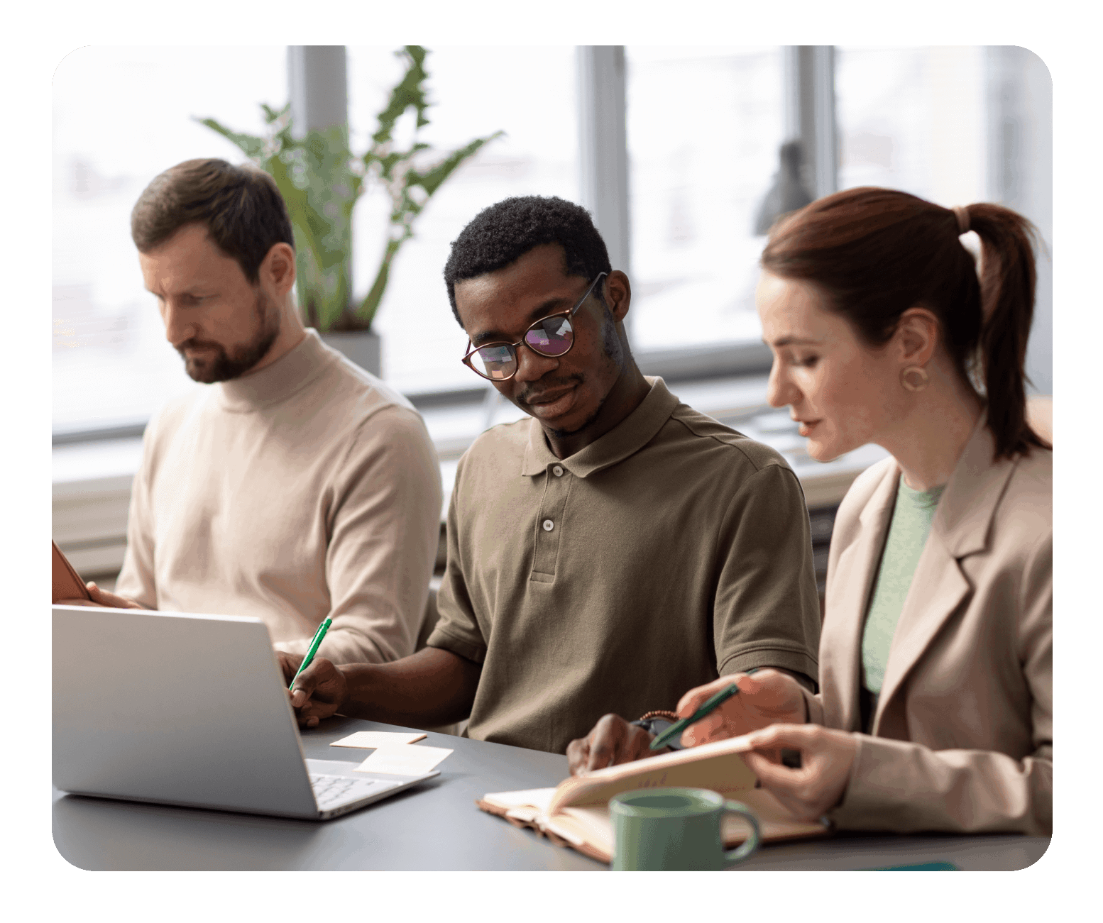 Three people working
