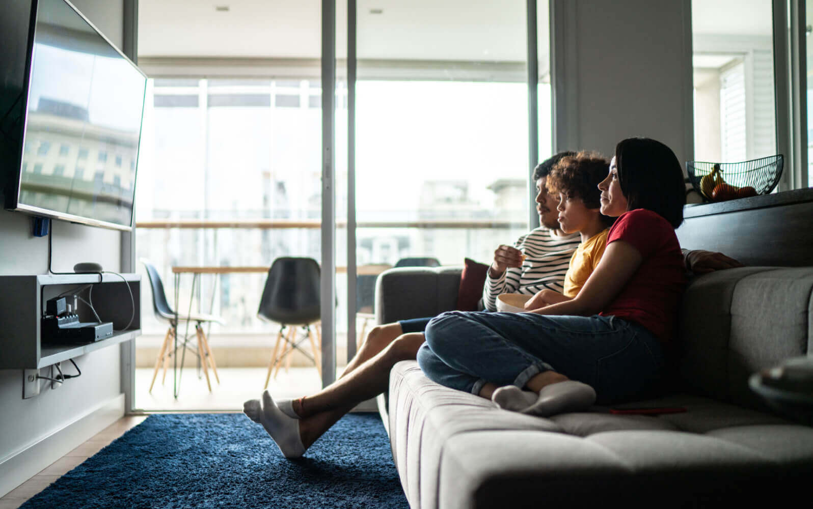 A family hanging out in the living room