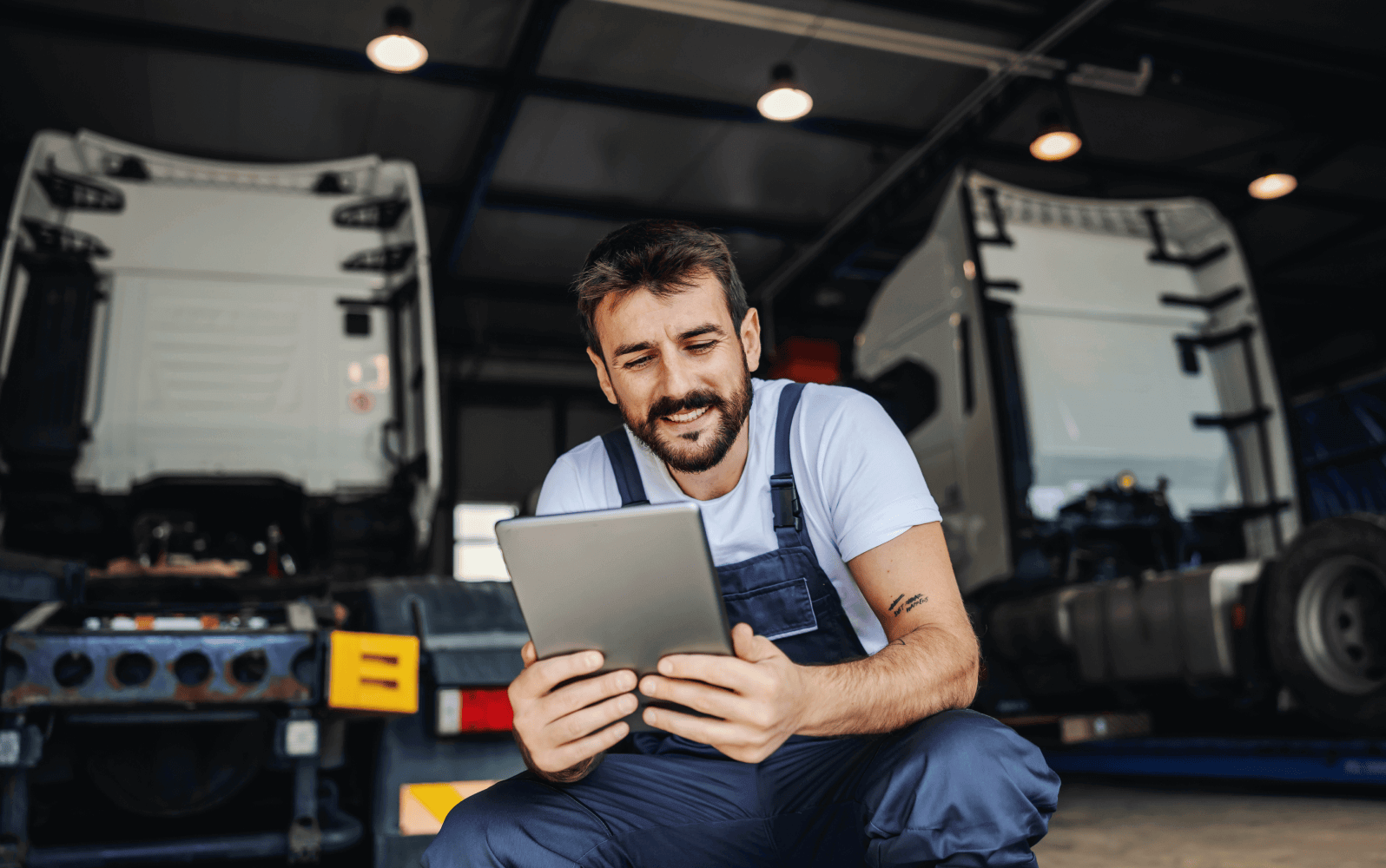 A retail shop worker holding a tablet