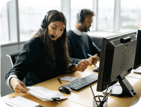 Two contact center agents at work