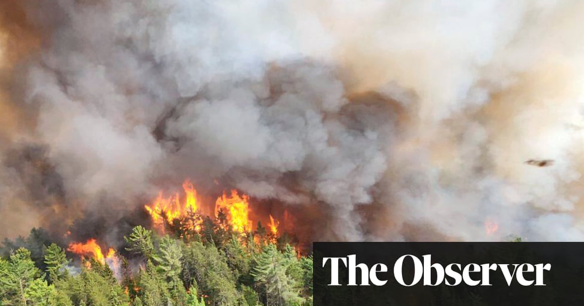 Exhausted crews battle Canadian wildfires as experts issue climate warning
