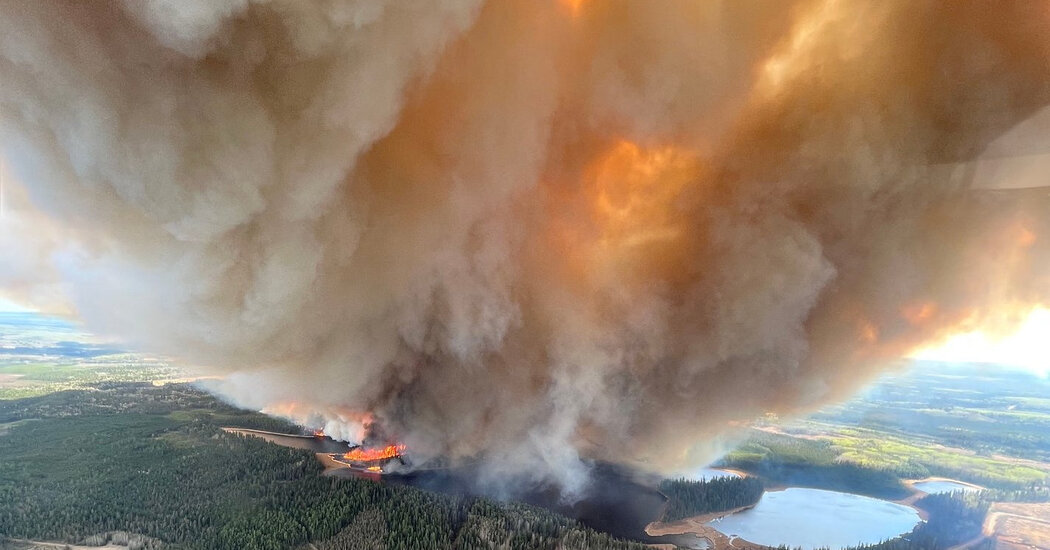 More than 13,000 Evacuated as Wildfires Burn in Western Canada
