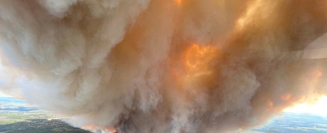 More than 13,000 Evacuated as Wildfires Burn in Western Canada
