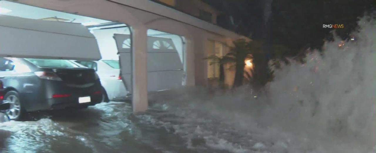 Water main break damages garage door, floods Northridge street
