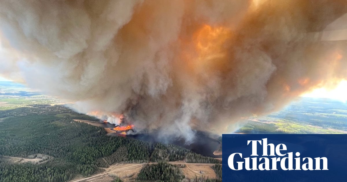 Thousands forced to evacuate as wildfires ravage western Canada