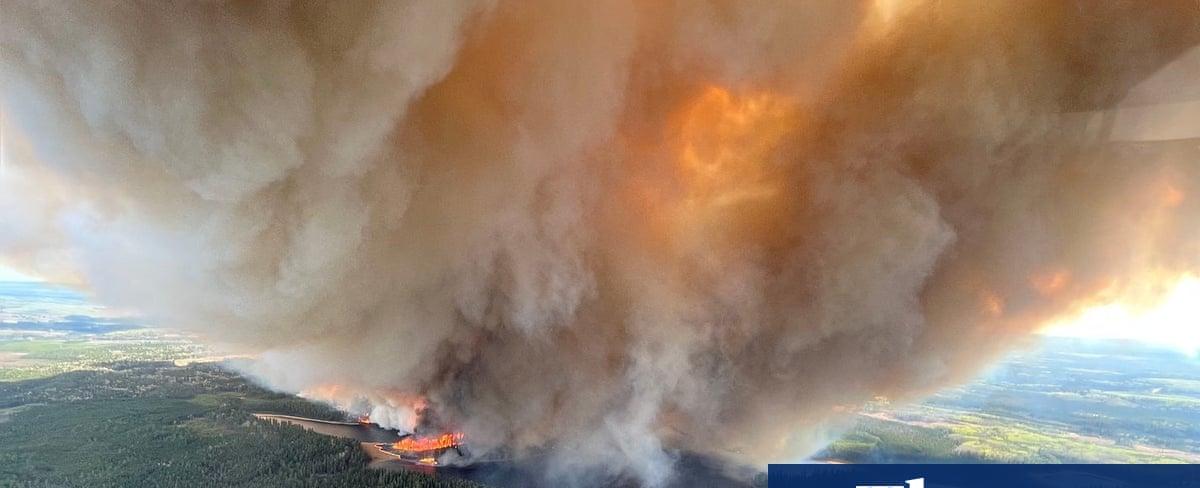 Thousands forced to evacuate as wildfires ravage western Canada