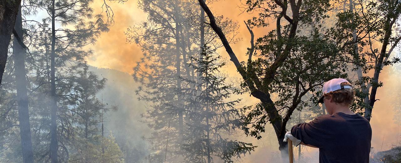 Fighting fire with fire: Volunteers help southern Oregon homeowners remove tree debris with a permitted prescribed burn