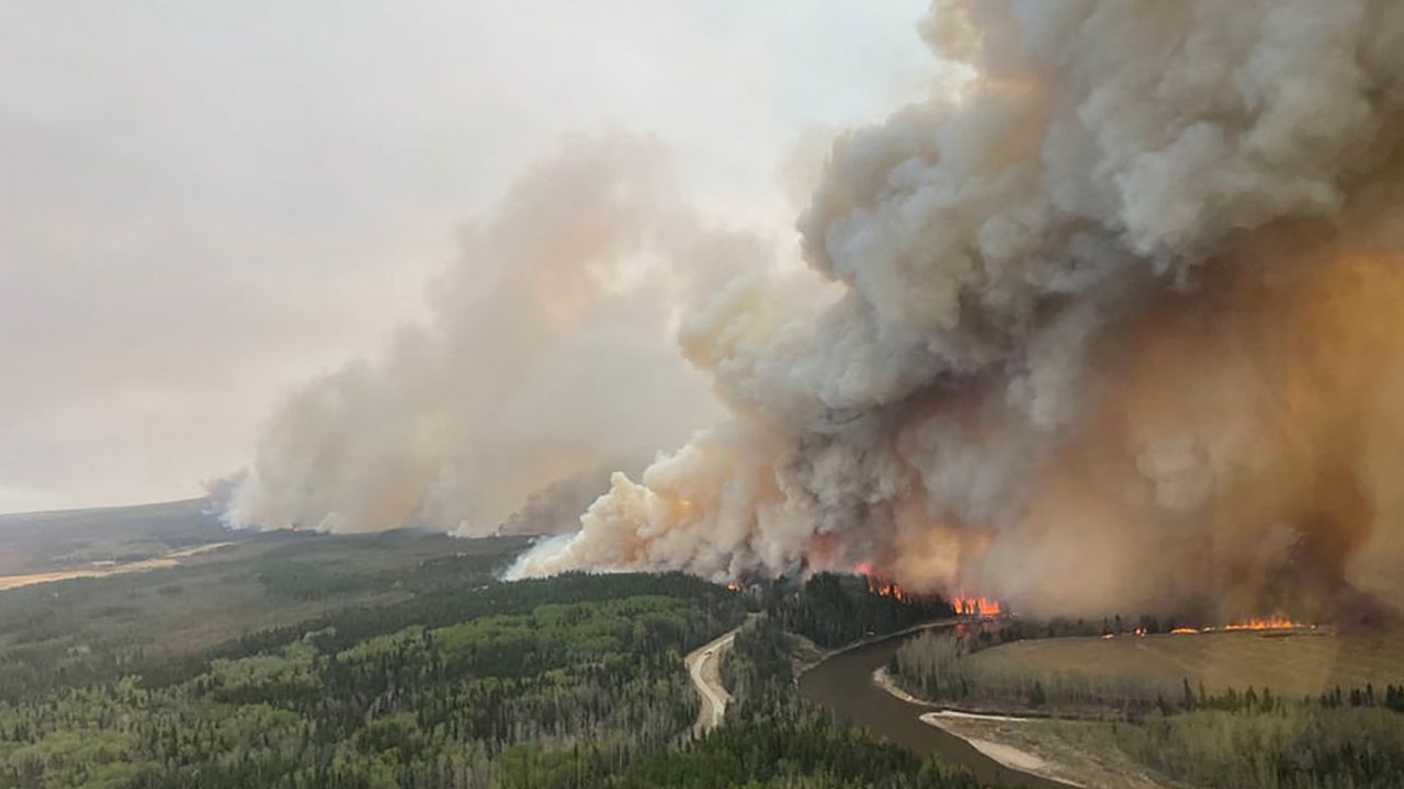 Thousands Evacuated as Wildfires Spread Across Alberta, Canada