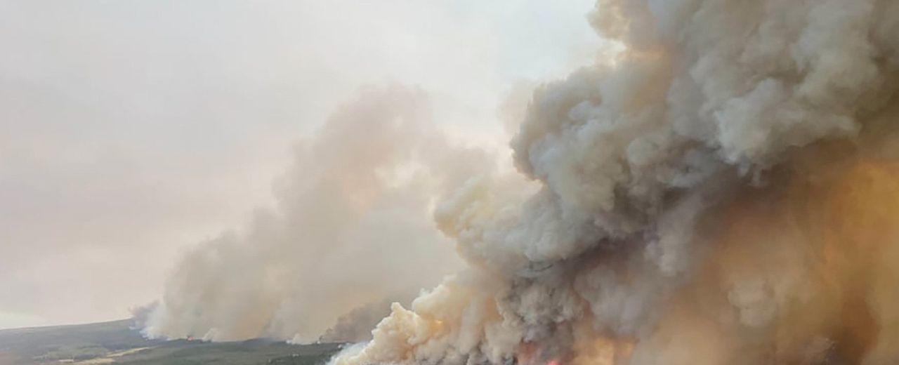 Thousands Evacuated as Wildfires Spread Across Alberta, Canada