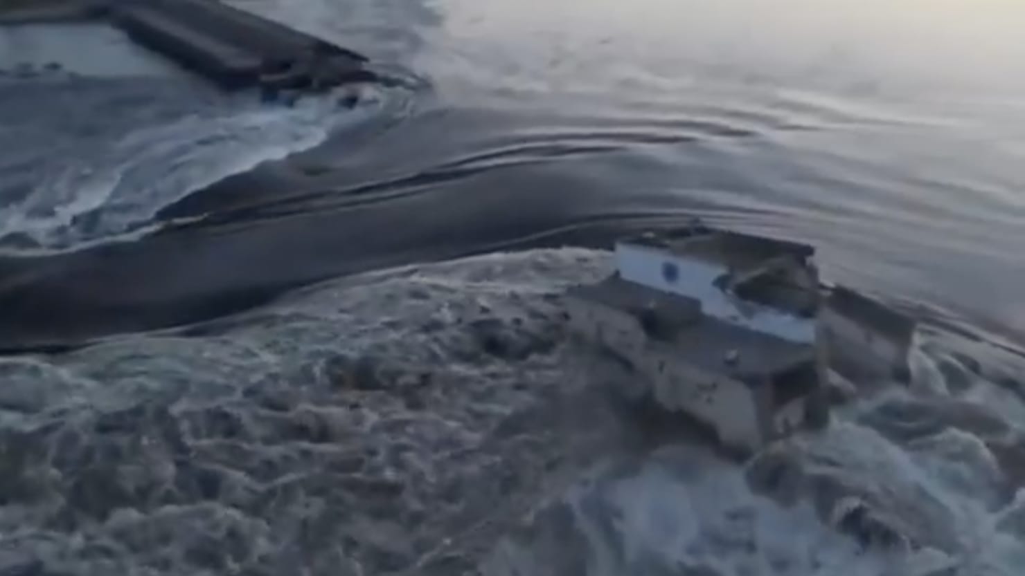 Dam Blown up Unleashing Floods and Threatening Ukrainian Nuclear Plant