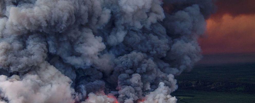 How Canada's wildfires and air quality warnings are connected to climate change