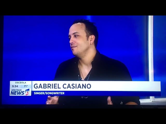 Gabriel Ca.siano en Spectrum News 13 promotional interview for Hurricane Maria benefit concert.