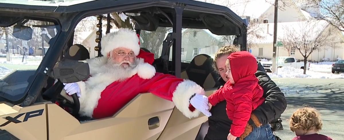 Bountiful man spreading Christmas joy after April storms slaw Utah with snow