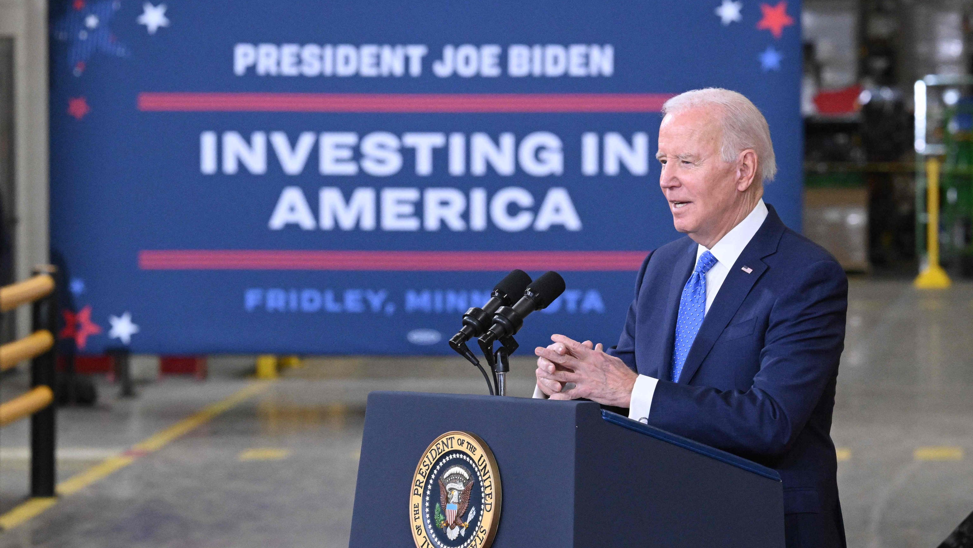 Biden boosts wind, solar plants in fight against climate change
