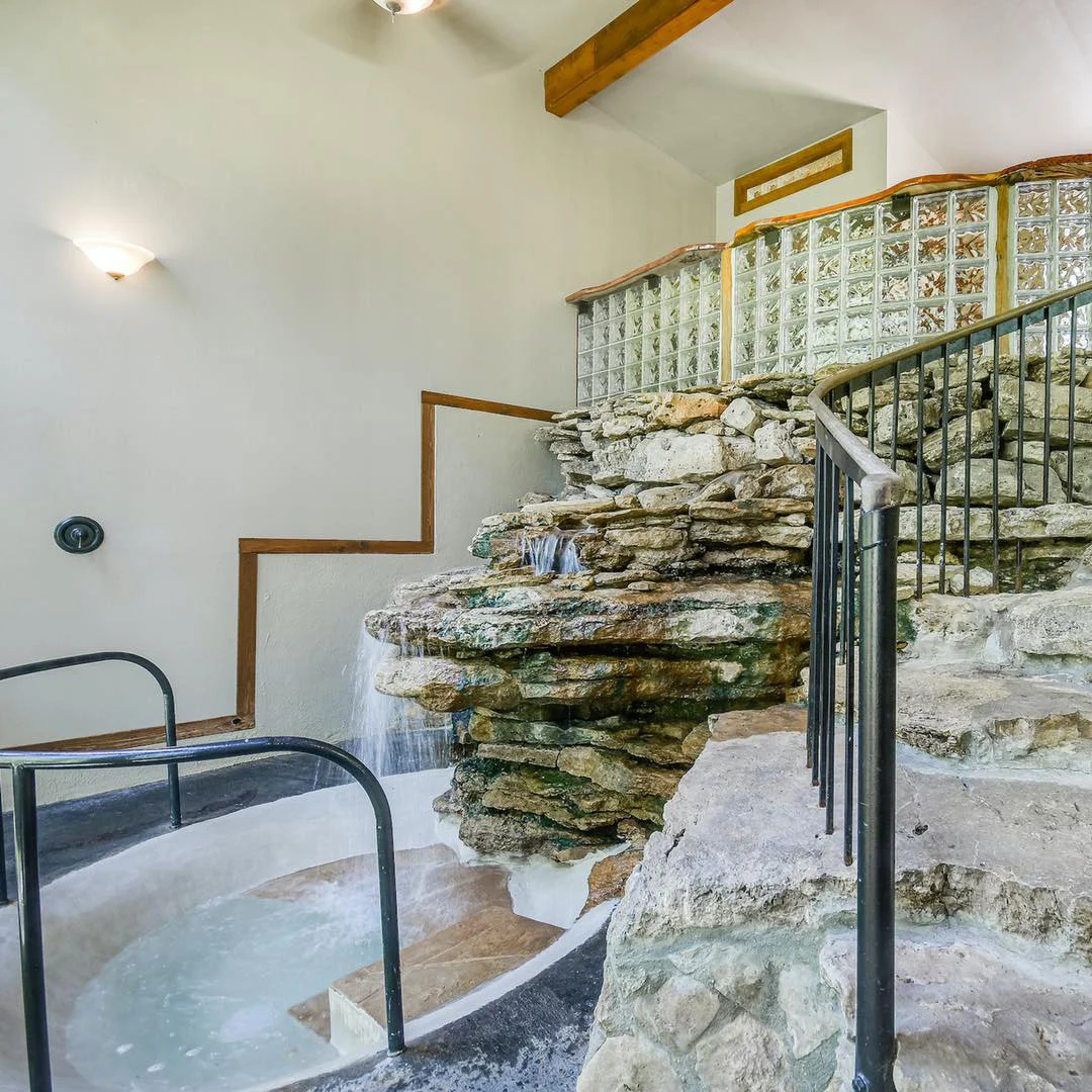 cypress-valley-treehouses-spicewood-texas-waterfall