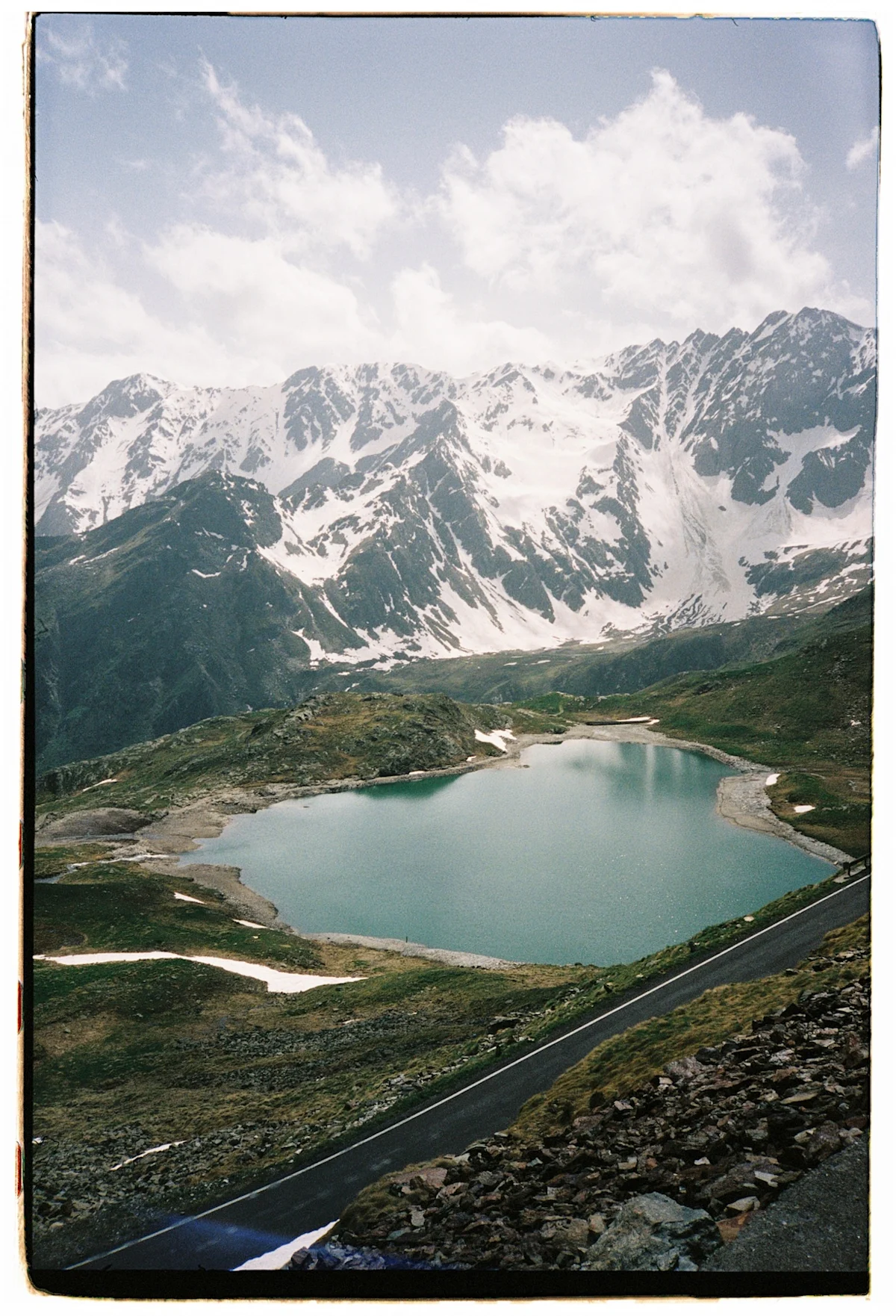 team-dream-bicycling-team-tirano-pop-up-mountain-lake-road-vertical