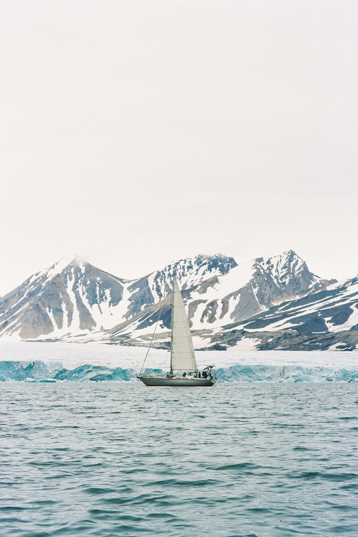 zeger-dox-svalbard-sailboat-glacier-vertical