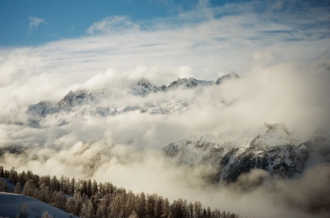 eric-greene-chamonix-ski-patrol-mountain-behind-clouds