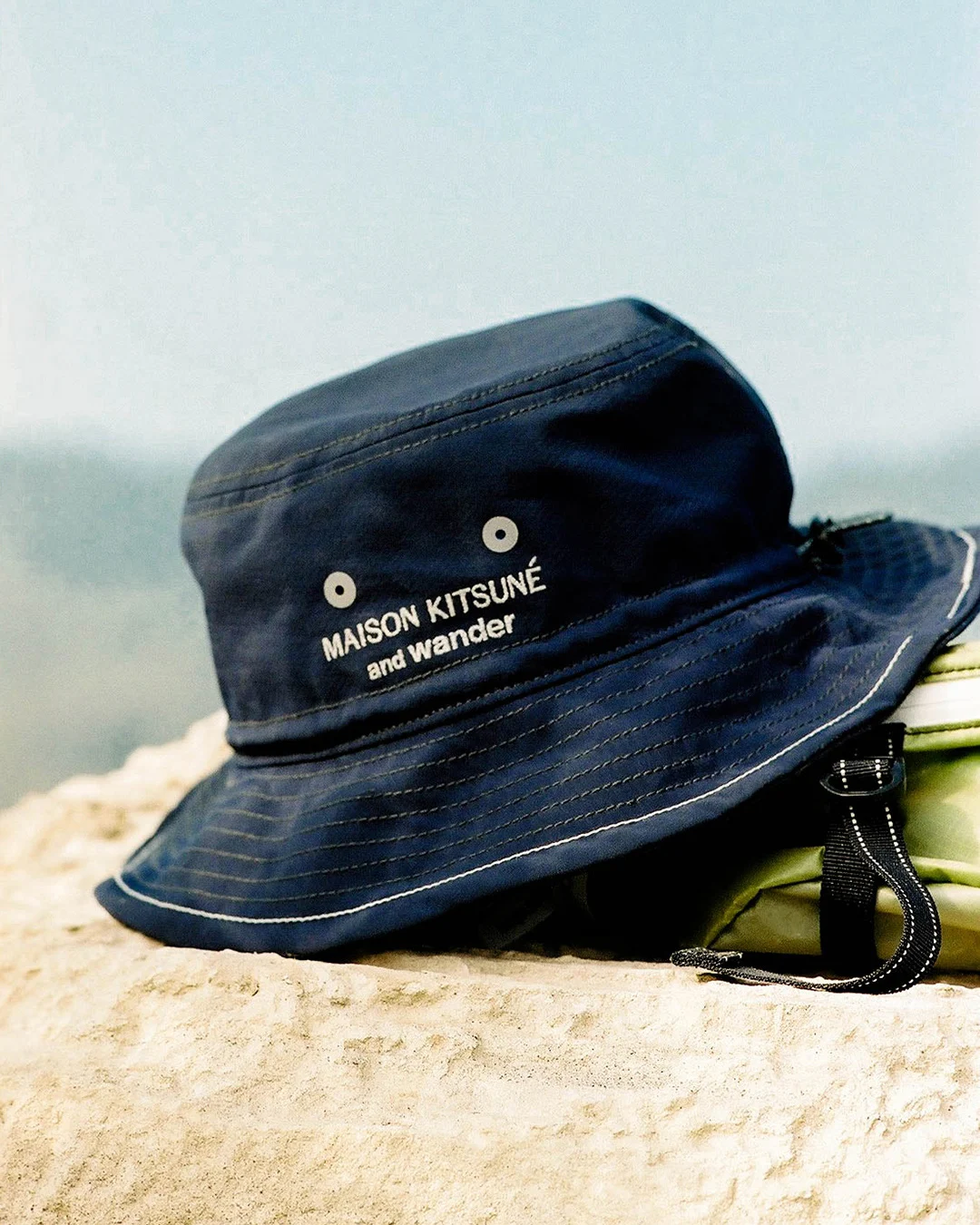 and-wander-maison-kitsune-hiking-collab-bucket